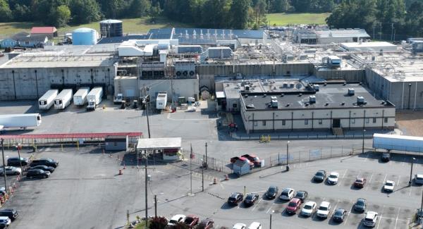 Aerial view of the Boar's Head processing plant in Jarratt, Virginia with parked cars, the origin of a listeria outbreak