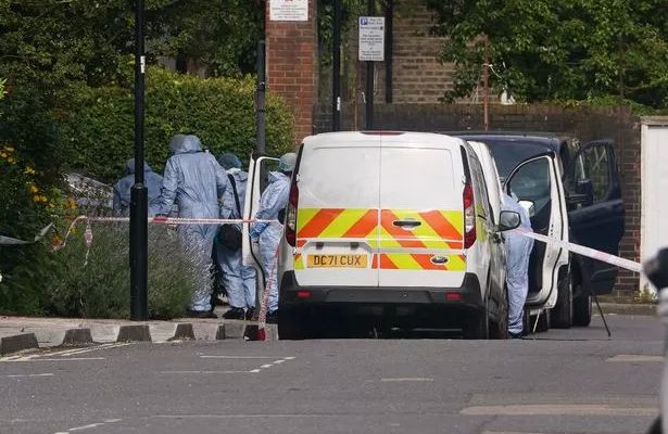 Forensic officers on Scotts Road